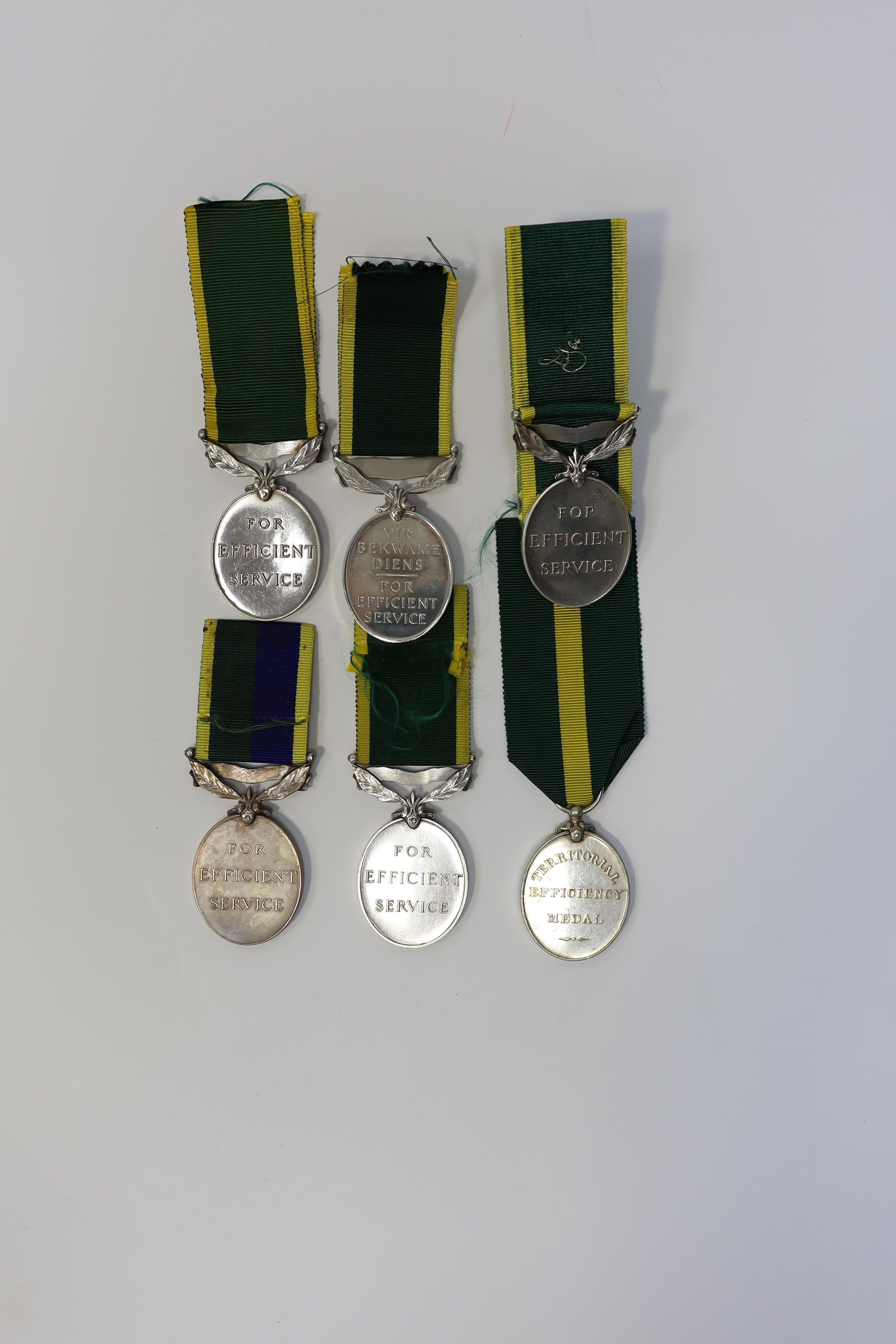 Six assorted Efficiency medals; GV (C) India to Pte.F.S.Slee,1 E.I.RY.R.,A.F.I.;GV (A) Territorial to 477046 Sjt H.W.Pawley, R.A.M.C.; GVI Militia to 2313197 Sclmn.S.H.Dummer, R.Signals.; GVI Territorial to 1434970 Gnr C